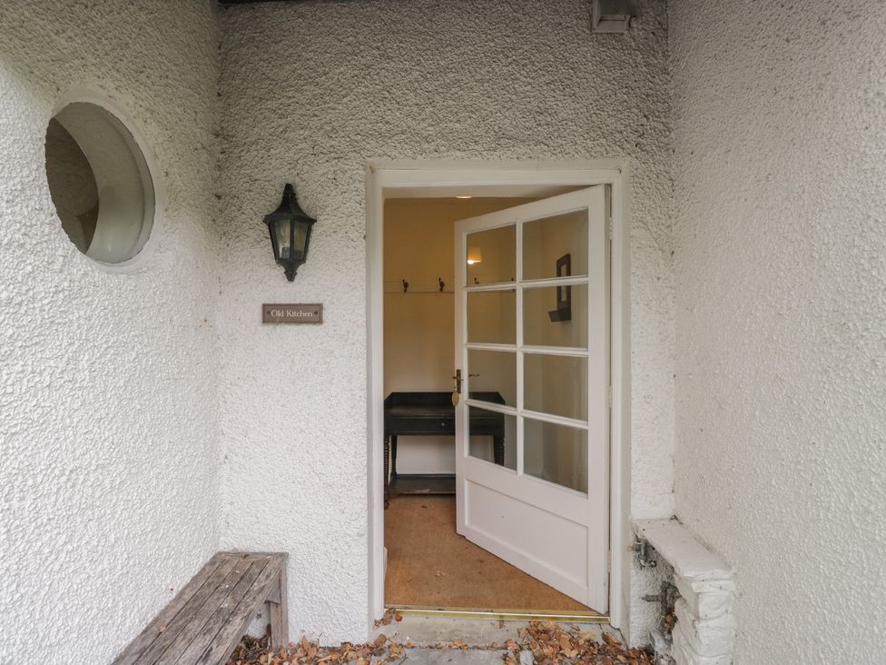 An entryway with a door and a sign at The Old Kitchen in Cartmel