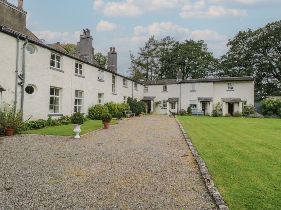 A house with a pathway and garden at The Old Kitchen in Cartmel