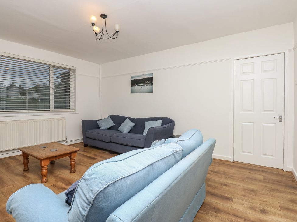 A living room with sofas and a coffee table at Tan Y Mynydd in Dwygyfylchi