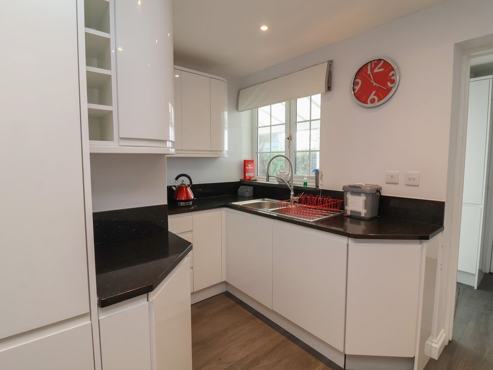 A kitchen with a sink and kettle at Atlantic View, Poundstock near Bude