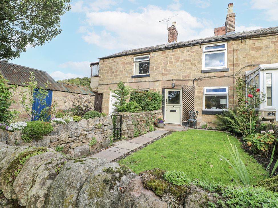 A house with a pathway and garden at 5 Belper Lane End in Belper