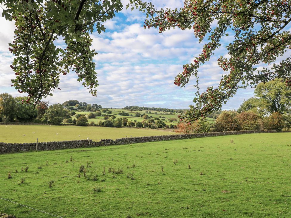 A landscape with green fields and trees at 5 Belper Lane End in Belper