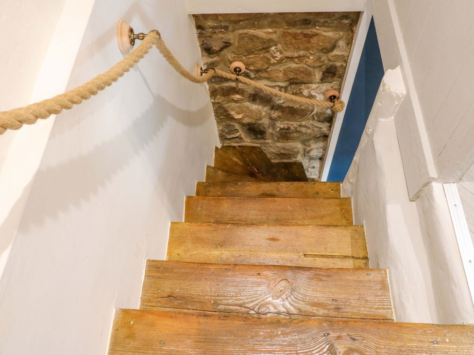 Stairs with rope railing and stone wall at 5 Belper Lane End Belper