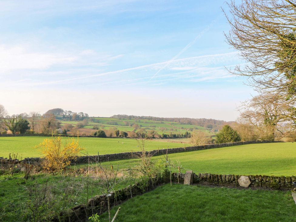 A view of a green field and hills at 5 Belper Lane End in Belper