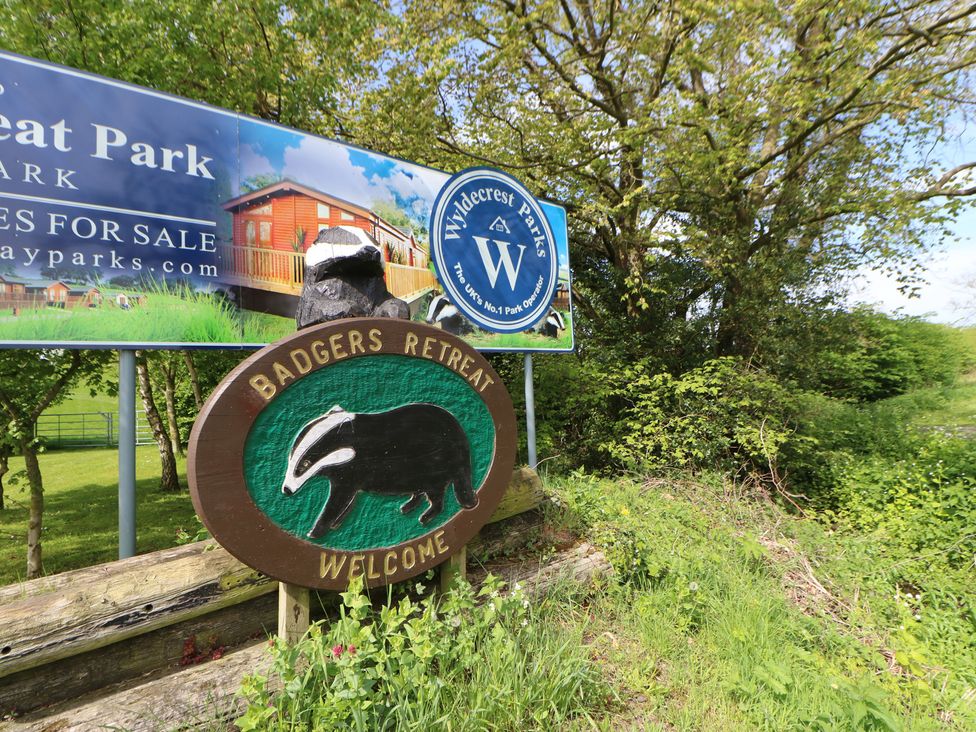 A sign for Badgers Retreat at Wyldecrest Parks in Richmond