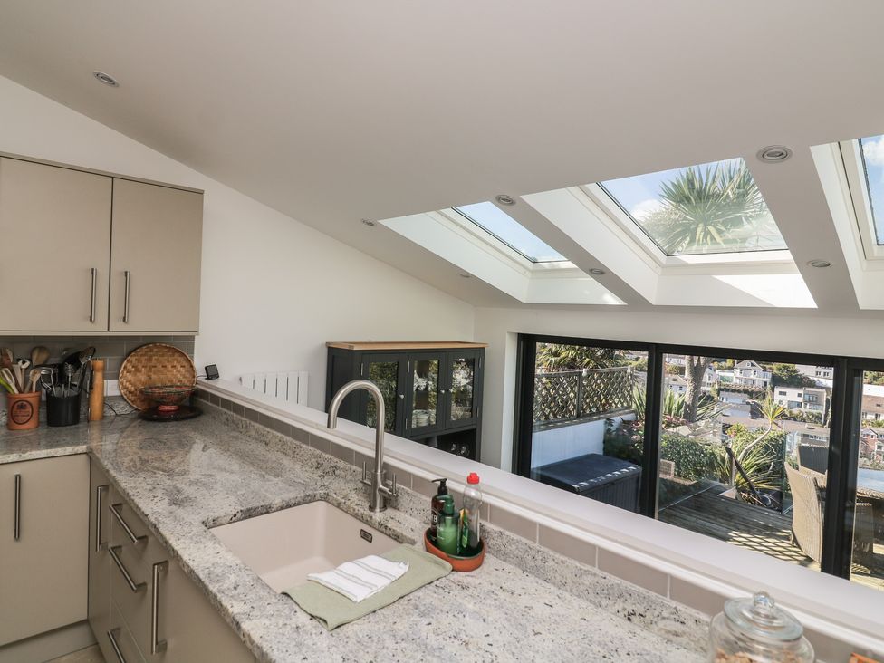 A kitchen with cabinets and a sink at 36 Crowthers Hill in Dartmouth