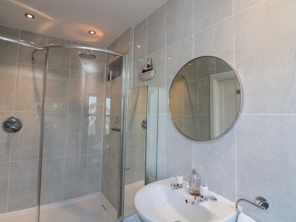 A bathroom with a shower and sink at 36 Crowthers Hill Dartmouth