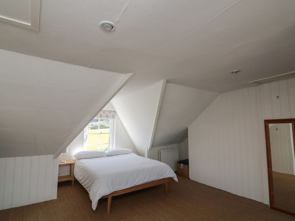 A bedroom with a bed and window at 36 Crowthers Hill in Dartmouth