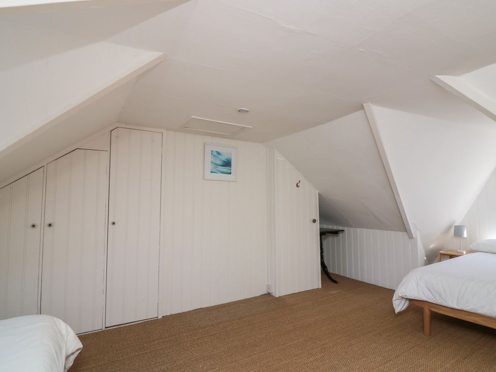 A bedroom with a bed and closet at 36 Crowthers Hill in Dartmouth