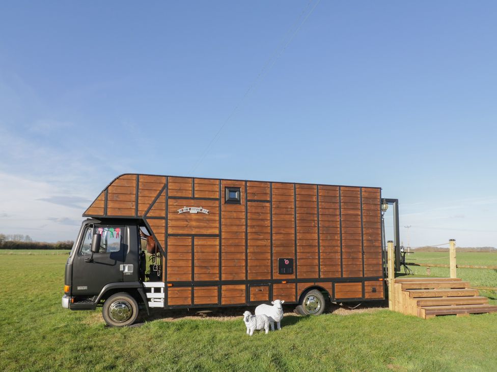 A horsebox with steps and a dog at GiGi's Horsebox in Evesham