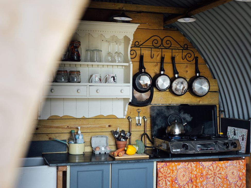 A kitchen with a stove and utensils at Goldfinch in Launceston