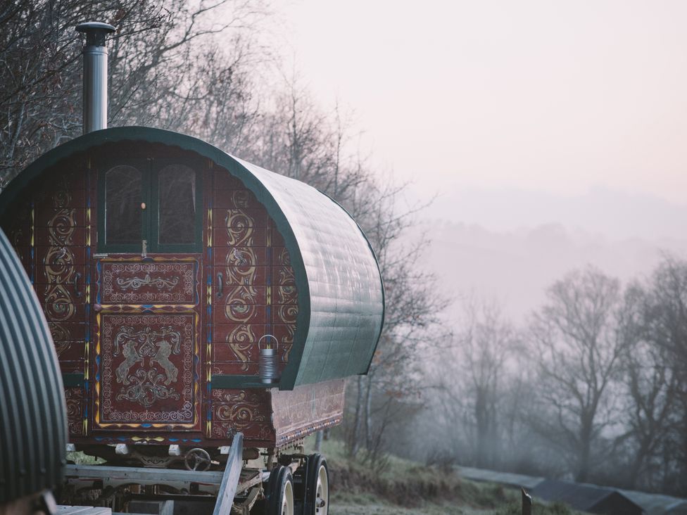 A decorative caravan in a misty landscape at Goldfinch Launceston