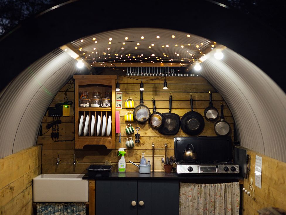 A kitchen with a sink and cooking area at Prudence in Launceston