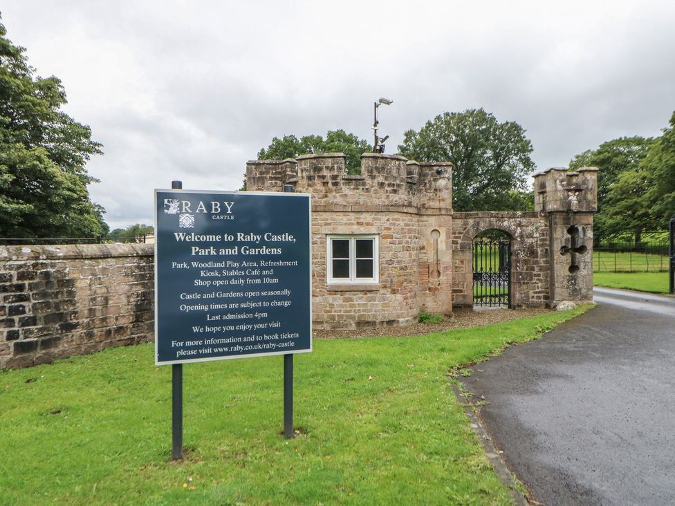 Welcome sign and gate at Raby Castle Park and Gardens in Barnard Castle