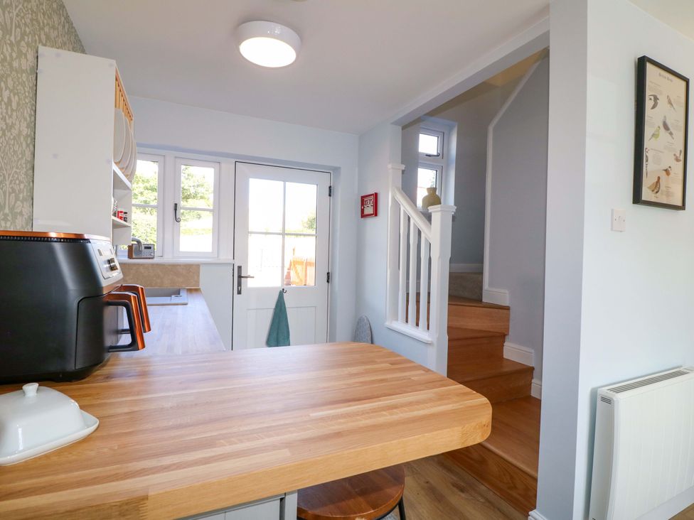 A kitchen with a counter and air fryer at Prospect Cottage 