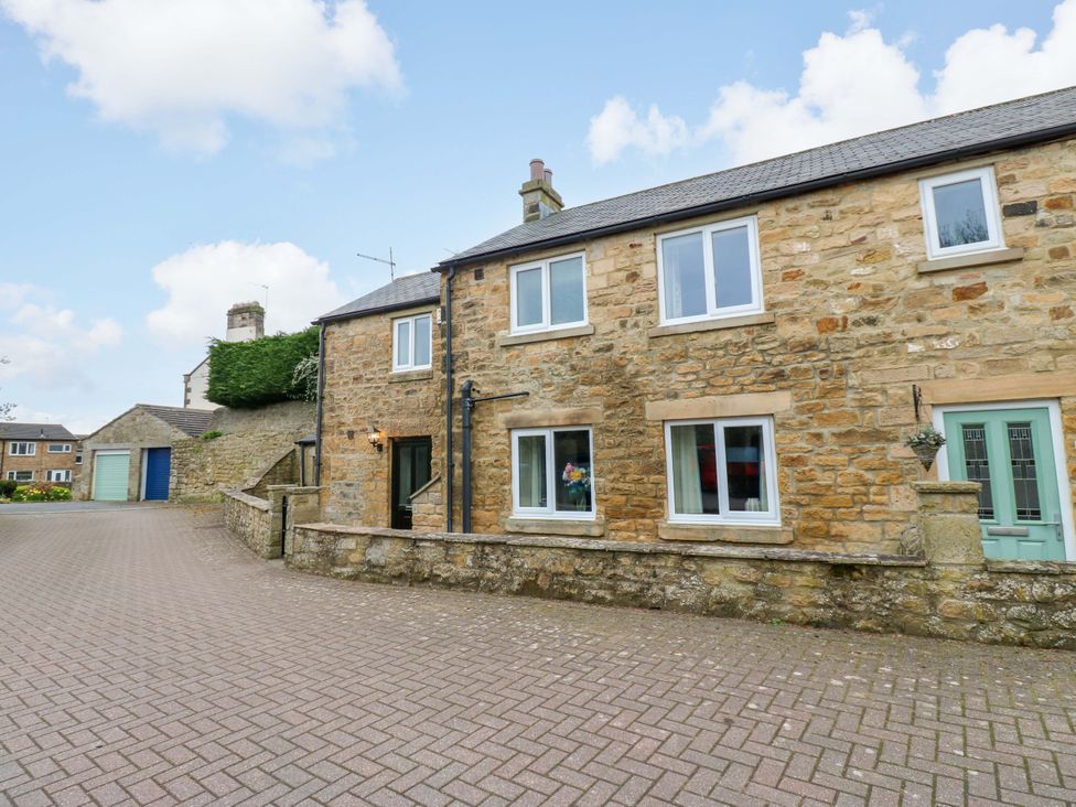 An outdoor view of a house with a driveway at 1 Kyles Yard Barnard Castle