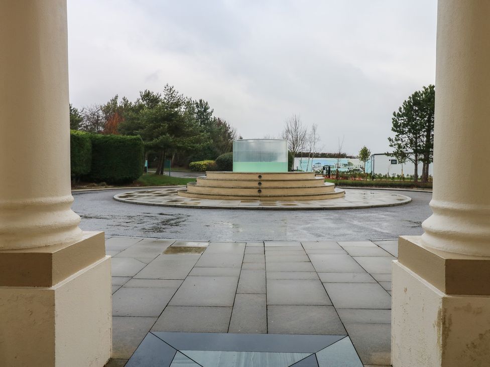 A view of a fountain and pathway at Costal Lodge at Seaham Hall in Seaham
