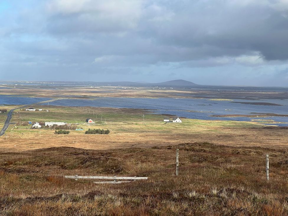 A landscape with houses and a road in Creagorry