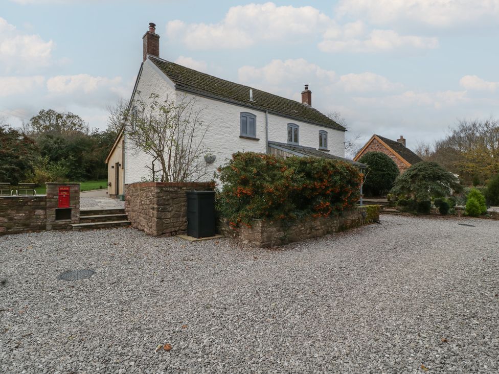 A house with a garden and pathway at 3 bed property
