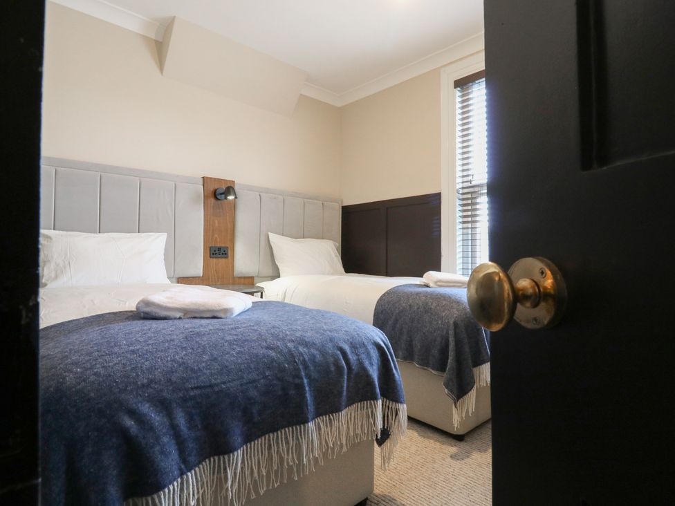 A bedroom with two beds and a window at Seibiant in Ramsgate