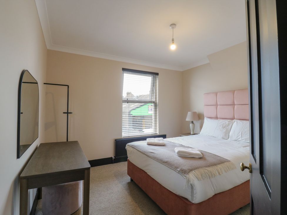 A bedroom with a bed and a desk at Seibiant in Ramsgate