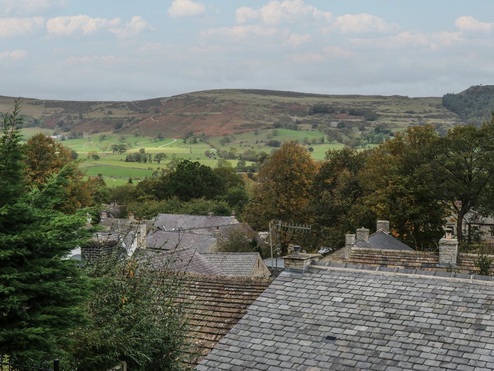A view of rooftops and hills at Bradshaw House in Hope Valley