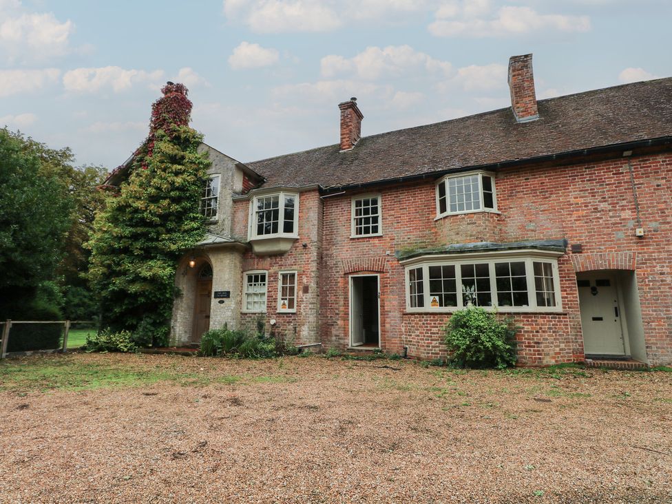 A house with a gravel driveway at Old Vicarage