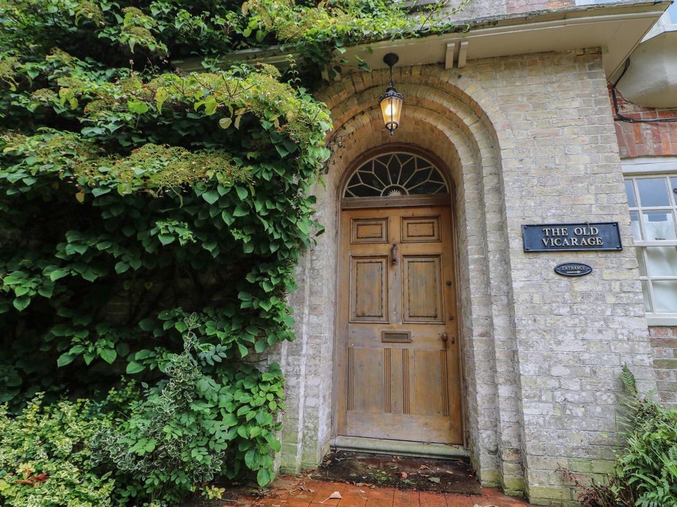 A front door with greenery at The Old Vicarage