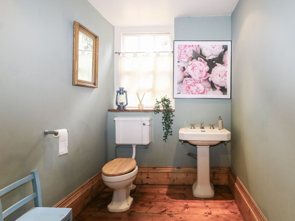 A bathroom with a toilet and sink at Old Vicarage