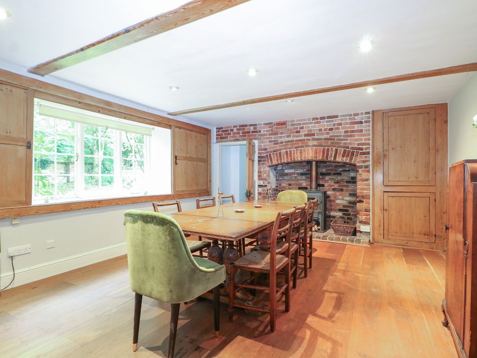 A dining room with a table and chairs at Old Vicarage in 