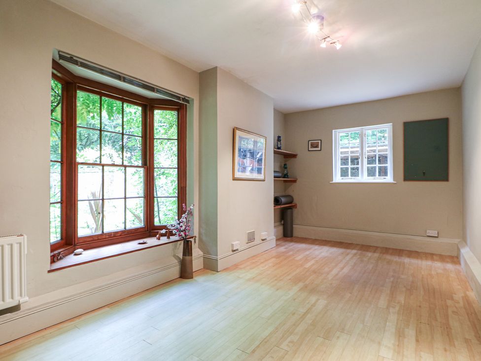 A room with a window and a shelf at The Old Vicarage 