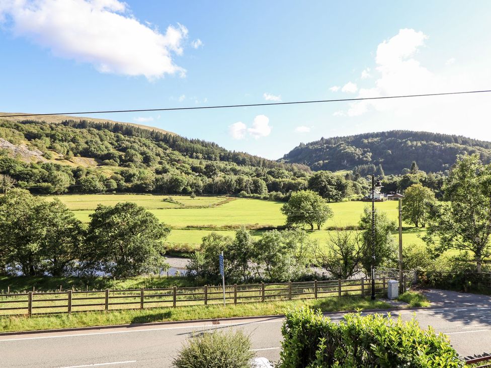 A view of fields and mountains at Haulfryn in Dolwyddelan