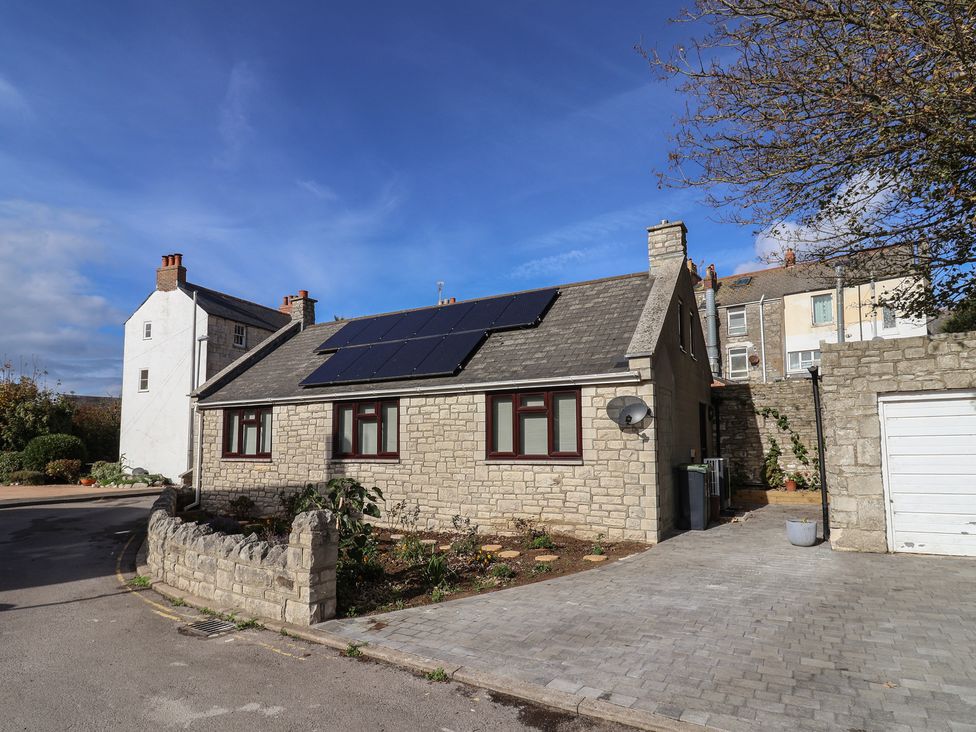 A house with solar panels at Arum, Portland Bill