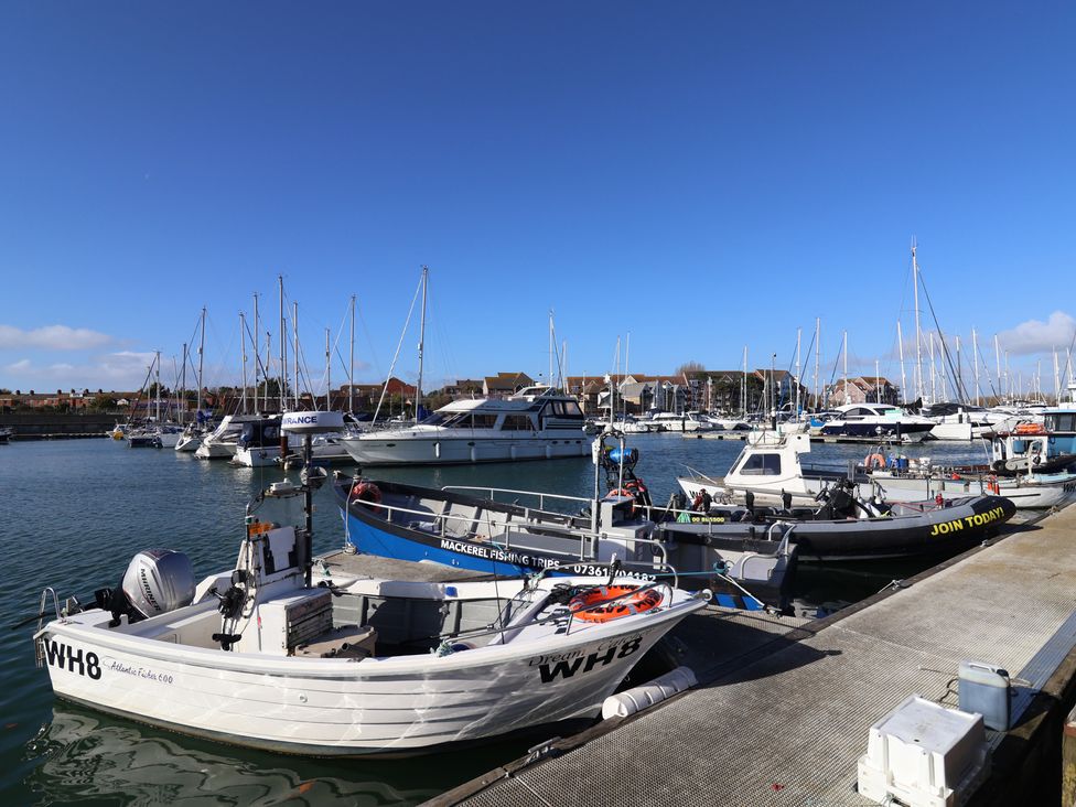 Boats at a marina at Arum Portland Bill