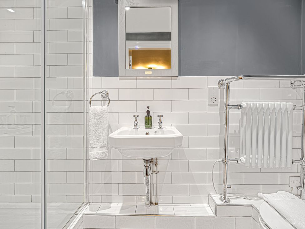 A bathroom with a sink and mirror at Central Vista Retreat in Chester