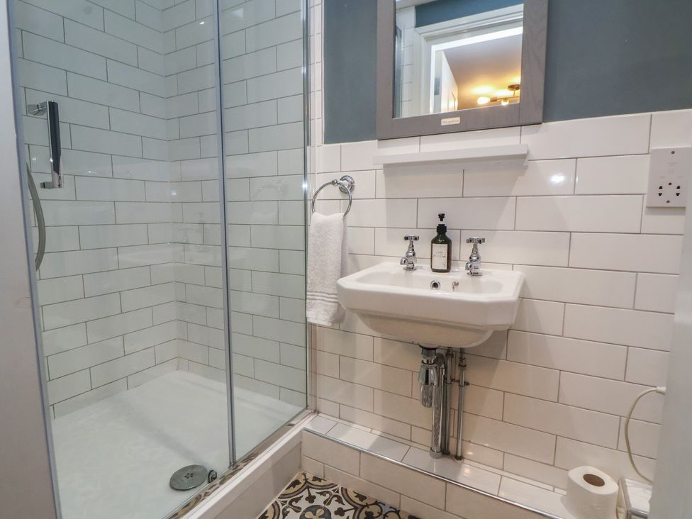 A bathroom with a shower and sink at Central Vista Retreat in Chester