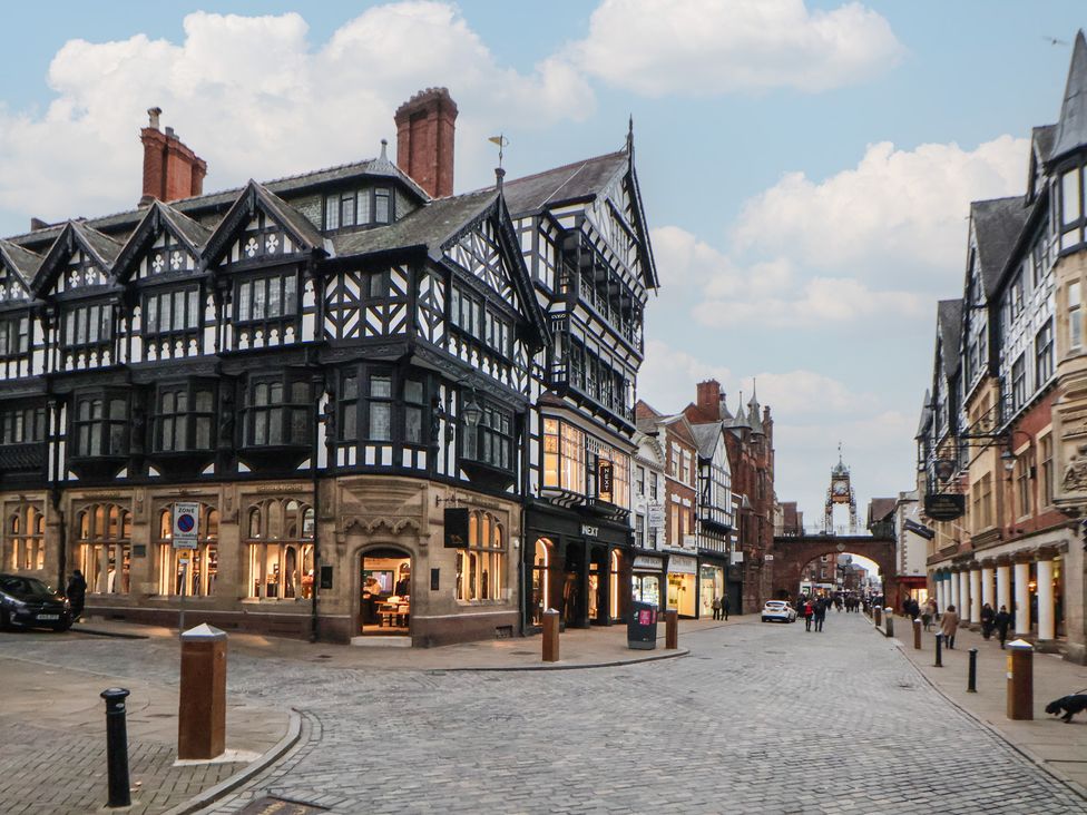 An outdoor street with shops and buildings at Ravenswood Penthouse in Chester