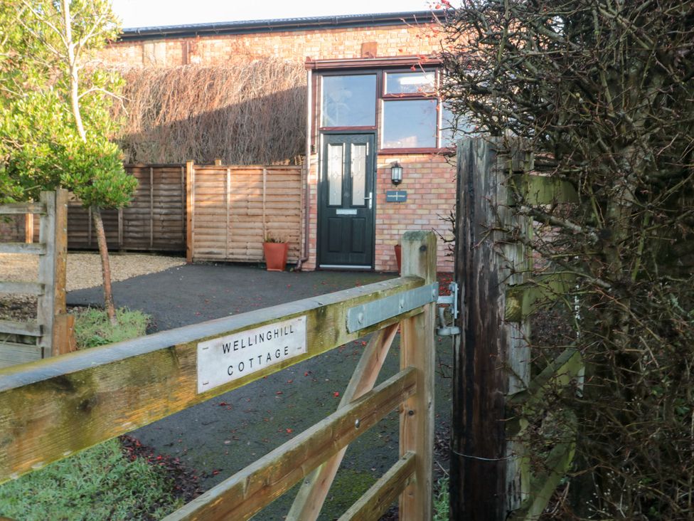 An exterior view of Wellinghill Cottage at Wellinghill House in Charlton Kings