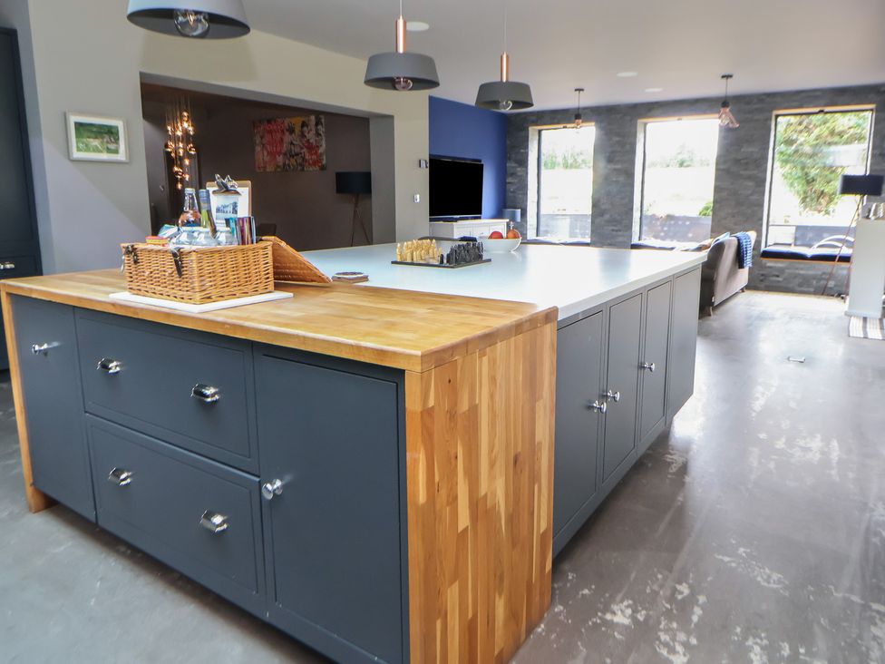 A kitchen with a central island at Rook Hall Farm Butterton near Newcastle-Under-Lyme