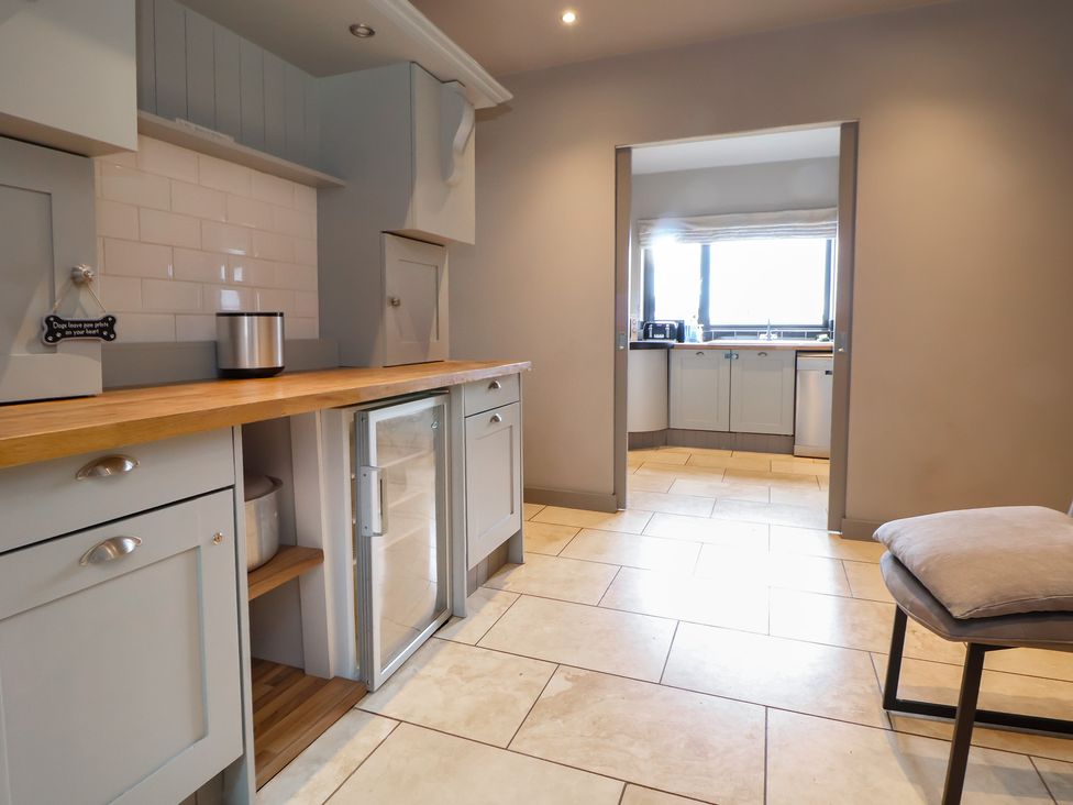 A kitchen with cabinets and a countertop at Rook Hall Farm Butterton near Newcastle-Under-Lyme