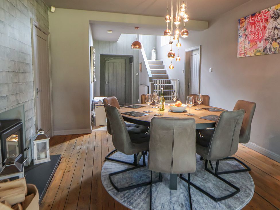 A dining room with a table and chairs at Rook Hall Farm Butterton near Newcastle-Under-Lyme
