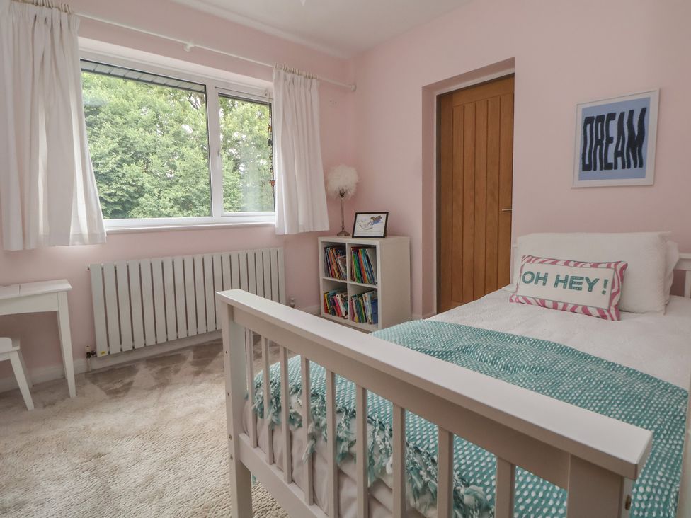 A bedroom with a bed and desk at Rook Hall Farm Butterton near Newcastle-Under-Lyme