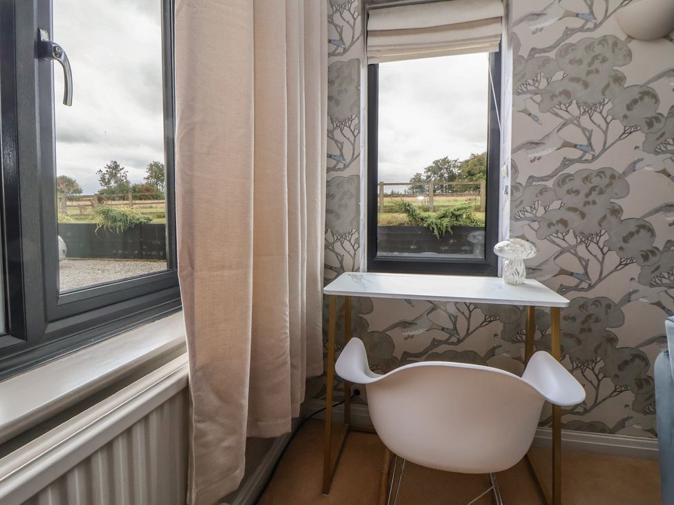 An office with a desk and chair next to the window at Rook Hall Farm Butterton near Newcastle-Under-Lyme