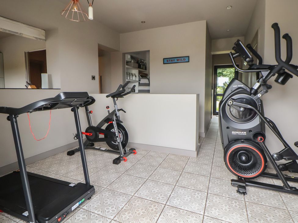 A gym with treadmill and exercise bike at Rook Hall Farm Butterton near Newcastle-Under-Lyme