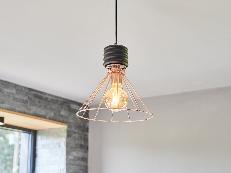 A light fixture with a visible light bulb at Rook Hall Farm Butterton near Newcastle-Under-Lyme