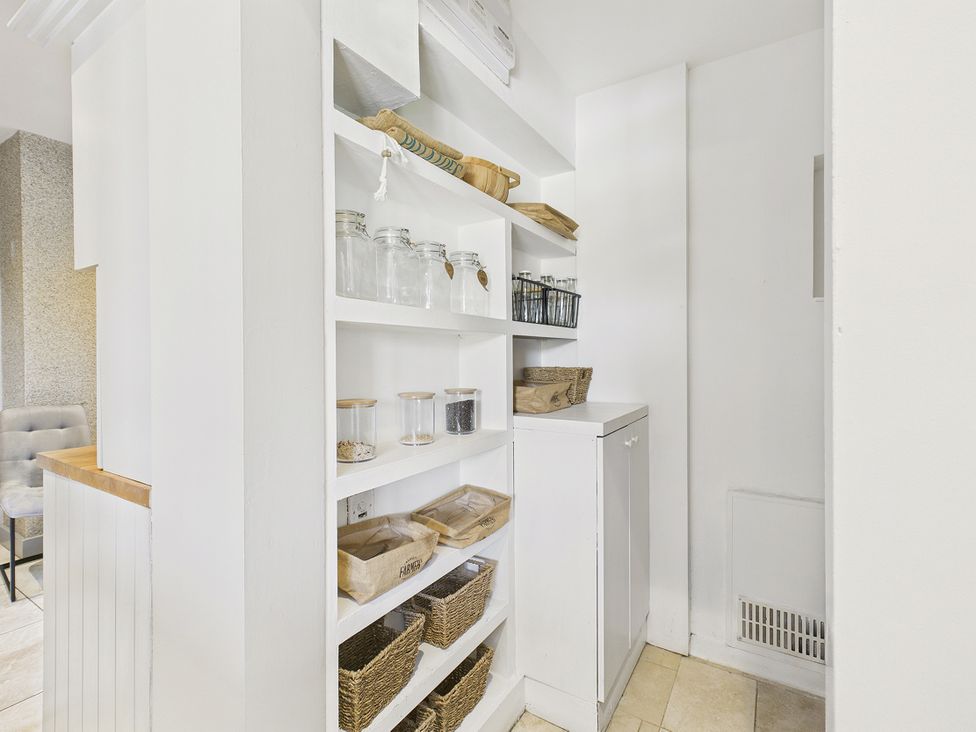 A kitchen with shelves and jars at Rook Hall Farm, Butterton near Newcastle-Under-Lyme
