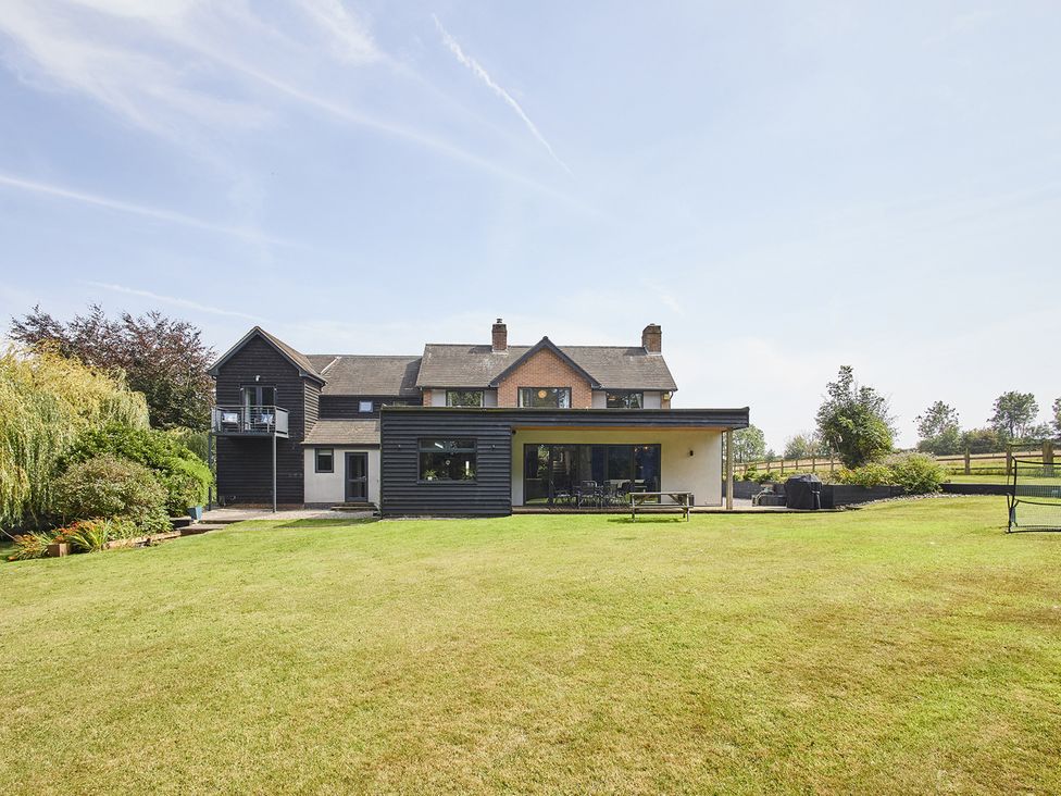 A house with a garden and lawn at Rook Hall Farm Butterton near Newcastle-Under-Lyme