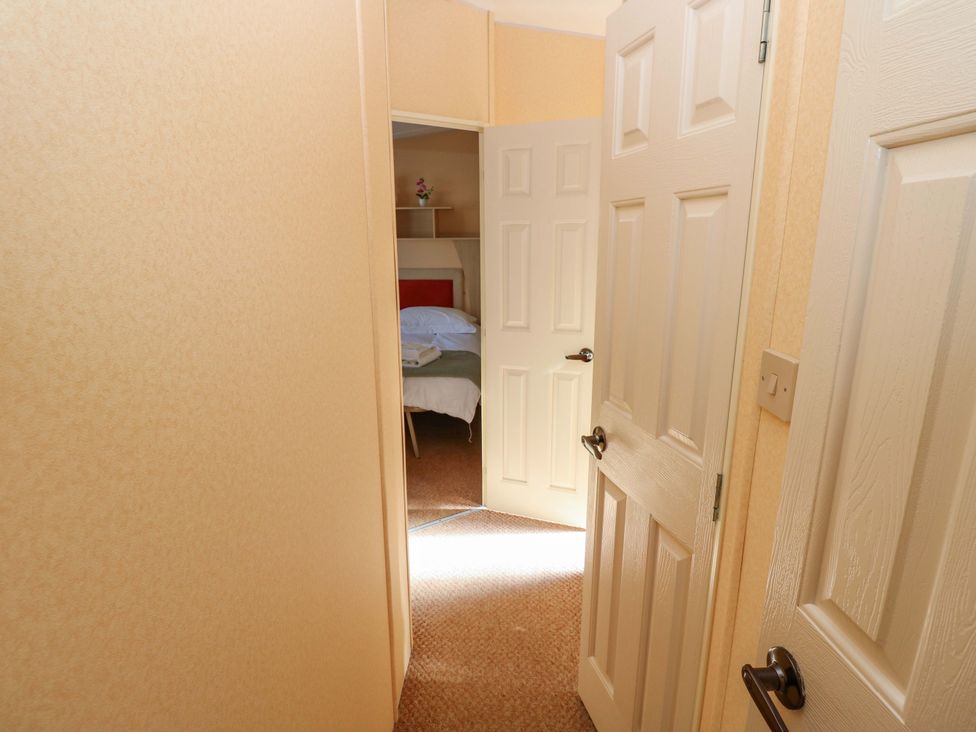 A view of a hallway leading to a bedroom at Number 38 in Chichester