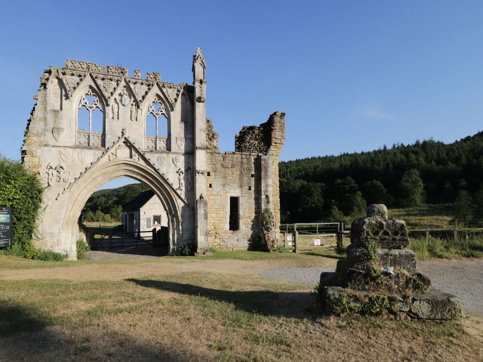 Building ruins with an archway and trees at 2 Jade side, Malton