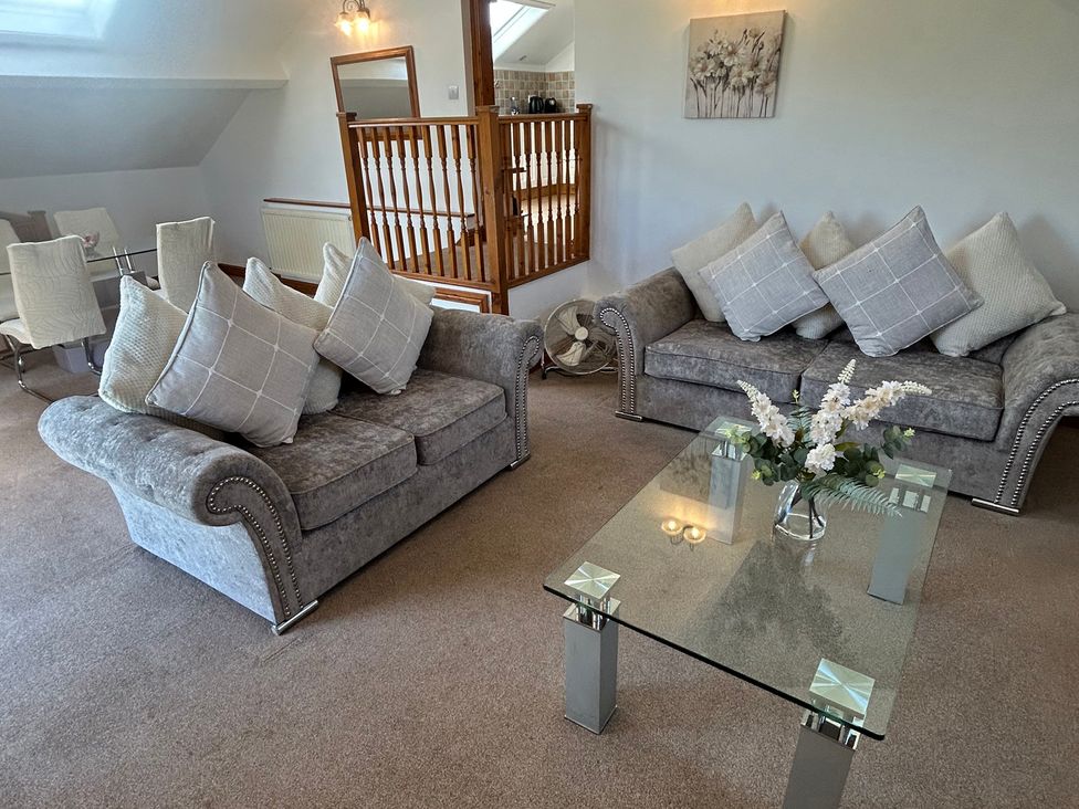 A living room with a sofa and coffee table at East Cottage East Knapton near Rillington